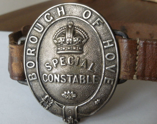 Hove Special Constable Arm Band
White Metal Special Constable Arm Band Borough of Hove Police on leather buckled strap
Keywords: Hove Special Armband