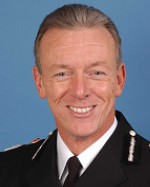 Bernard Hogan-Howe Chief Constable Merseyside Police
Bernard Hogan-Howe was born in Sheffield. He has an MA in Law from Oxford University, a diploma in Applied Criminology and was awarded an MBA in Business Administration from Sheffield University.

He joined South Yorkshire Police in 1979 where he worked as District Commander, Doncaster West Area and also headed departments in traffic policing and a team responsible for implementing a comprehensive reorganisation of South Yorkshire Police. He has experience in crime investigation and strategic leadership of major public events, public disorder and organised crime, particularly involving the use of firearms.

In 1997, he joined Merseyside Police as ACC Community Affairs before taking responsibility for Area Operations in 1999. He has been Gold Commander for the Grand National, the Millennium celebrations and Open Golf Tournament. He was Gold Commander during the Petrol Disputes of 2000/2001.

Mr Hogan-Howe joined the Metropolitan Police Service as Assistant Commissioner in July 2001, with responsibility for Human Resources. During this time, he led a team which recruited 10,000 officers and 1,500 Police Community Support Officers in 3 years. This helped the Metropolitan Police to attain 20% growth reaching 30,000 officers, the largest ever in the history of the Metropolitan Police. In his final year, the Force took 15% of recruits from the minority communities of London.

He also represented ACPO as Chair of the Personnel Committee and took part in National Terms and conditions discussions at the Police Negotiating Board in 2002/03 rejecting the Police Reform Act 2003.

He was appointed Chief Constable of Merseyside Police on 25 September 2004.
Mr Hogan-Howe is a Board Member of The Mersey Partnership.
Keywords: Chief Constable Merseyside Police
