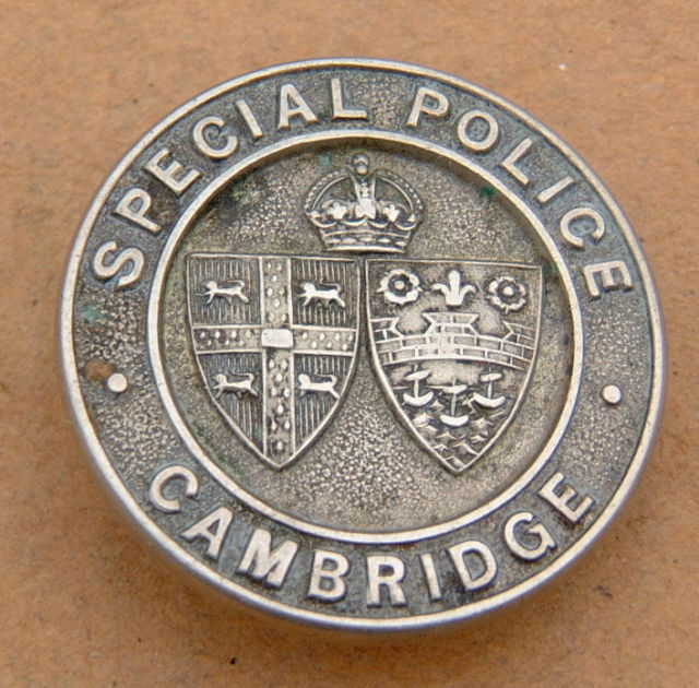 City of Cambridge & Cambridge University Special Police
White Metal badge on Half Moon Lapel fixing KC 
Keywords: Cambridge Lapel KC