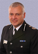 Clive Wolfendale Deputy Chief constable North Wales Police
Clive Wolfendale joined North Wales Police in 2001, following 25 years service with the Greater Manchester Force. He was educated at Manchester Grammar School and the University of Manchester. He holds a Diploma in Applied Criminology from Fitzwilliam College, Cambridge and a Masters degree in Business Administration from the Manchester Business School.
He has enjoyed a wide-ranging police career and has retained a particular interest in IT and forensic sciences.

Formerly head of the Scenes of Crime Department in Greater Manchester, Mr Wolfendale now chairs the Forensic Science Training Strategy Group for ACPO. He also chairs the National Footwear Board and the Forensic Science Sector Skills Council.
He has recently been appointed the ACPO Lead for the Schengen European Criminal Information System.

Keywords: Clive Wolfendale Deputy Chief constable North Wales Police