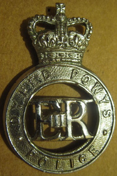 QC Cap Badge PC's and Sgt's Dyfed-Powys Police
Chrome cap badge
Keywords: QC Cap Badge Dyfed-Powys Police