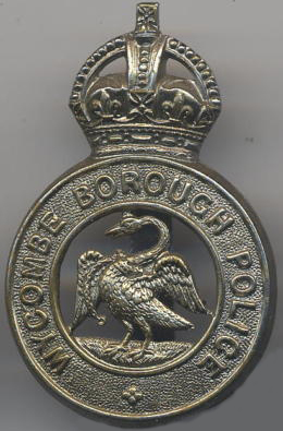 Wycombe Borough Police
Chrome plated cap badge with a slider.  Size: 50mm x 32mm. 

Wycombe Borough Police ceased to exist on 31st March 1947 upon amalgamation with the Buckinghamshire Constabulary.

There was no general issue of this badge to the lower ranks, only to the few drivers which they had on strength. 
Keywords: Wycombe Buckinghamshire