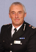 Richard Brunstrom Chief Constable North Wales Police January 2001 to July 2009
Richard Brunstrom joined Sussex Police in 1979 as a zoology graduate, and spent 11 years with the Force.
In 1990, he moved to Greater Manchester Police as a Superintendent, serving initially in Old Trafford/Stretford and then the Moss Side/Longsight areas. He regularly commanded the policing of Manchester United and Manchester City Football Clubs, and acquired extensive operational experience policing areas of inner city deprivation. Latterly he was Divisional Commander at Bury.
Mr. Brunstrom was appointed as Assistant Chief Constable in Cleveland in September 1995 and subsequently promoted to Deputy Chief Constable in that force. He joined North Wales Police at the beginning of 2000 and was appointed Chief Constable in January 2001.
Keywords: Richard Brunstrom Chief Constable North Wales Police