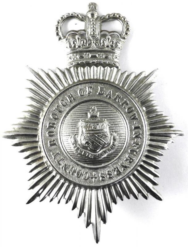 Barrow-in-Furness Day Helmet Plate Chrome plated QC 
Day time Helmet plate worn post 1953 until force merged with Lancashire Constabulary on 1st April 1969
Keywords: Helmet Plate Chrome Queens Crown Barrow Furness