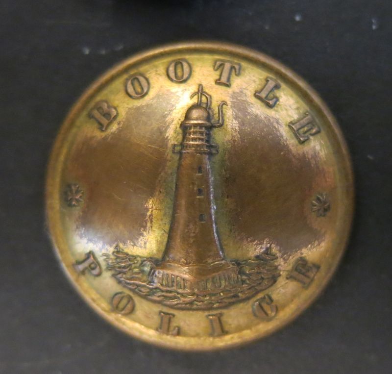 Bootle Tunic Button 
In the early days the police did not wear white metal buttons. This dome backed button dates from circa 1887 
Keywords: Bootle Brass Tunic Button