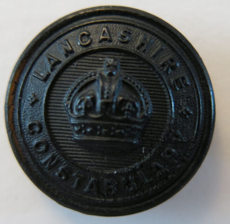 Lancashire Constabulary Black Tunic Button KC 24mm
Worn in the period from the late 1930's through to when the buttons changed to a St Edwards Crown in the early 1950's with ascension of Queen Elizabeth II.
Keywords: Lancashire Constabulary Black Tunic Button KC 