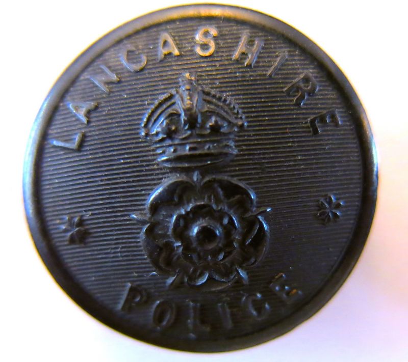 KC Black Greatcoat Button Lancashire Police 
Worn in the period from the early 1900's through to when the buttons took on the official title Lancashire Constabulary the exact date of which I am not sure but probably some time around the First World War. This 28 mm button would have been worn on a greatcoat and raincoat.
Keywords: Lancashire Police Button Black Great Coat KC