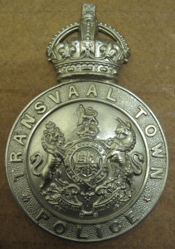 Small Helmet Plate Transvaal Police
This was the first plate worn between 1903 and approx 1909/10. It is WM and on copper lugs
Keywords: Transvaal Town Police Helmet KC WM
