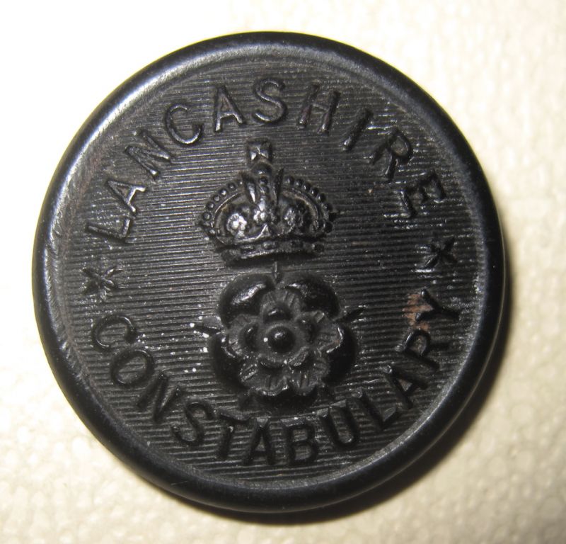 Lancashire Constabulary Black Tunic button KC Rose Pattern
Worn in the period from around the First World War through to when the buttons changed to the standard home office Pattern with a Tudor Crown and the force name in a circlet in the late 1930's.
Keywords: Lancashire Constabulary Black Button KC Tunic Rose