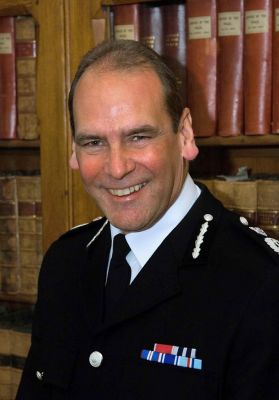 Sir Norman Bettison Chief Constable West Yorkshire Police
Sir Norman Bettison, has had a a 32-year career in policing taking in three major police forces and a number of National responsibilities.

He was appointed in December, 2006, but he was no stranger to the streets of West Yorkshire, having spent six years as an Assistant Chief Constable in the county up to 1998.

Sir Norman is 52 years of age; he is married and began his police career in 1972 when he joined South Yorkshire Police as a Police Cadet. He joined West Yorkshire as Assistant Chief Constable in 1993.

In 1998 he became Chief Constable of Merseyside where he served for six years. In 2004 he became Chief Executive at Centrex, an organisation that provided support, training and development to all UK police forces and also many international enforcement agencies.

Sir Norman holds a Master’s Degree in Philosophy and Psychology from Oxford University and a Master’s Degree in Business Administration from Sheffield Hallam University.

He is also a graduate of the FBI Executive Programme. He was awarded the Queen’s Police Medal for distinguished service in the Millennium Honour’s List, and received a Knighthood in the Queen’s Birthday Honours list for services to policing in 2006.

He is credited with being the pioneer of Neighbourhood Policing Teams (NPT) a style of policing that engages with local people in addressing and resolving local issues.
Keywords: Chief Constable West Yorkshire Police