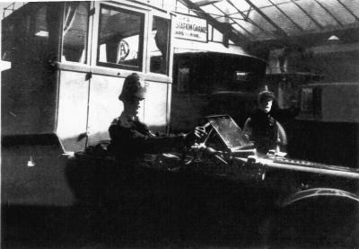 First Folkestone Borough Police car
Very dark photo of PC 22 BAILEY, of the Folkestone Borough Police, taking possession of the first police car to be used in the town.   The make and model is unknown
Keywords: Folkestone MV