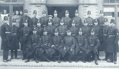 Gloucestershire Officers seconded to Tonypandy in 1911
Back row: Pc 326 Harold Illes, Pc 232 Charles Coldicott, Pc 18 William Fry, Pc 47 Arthur Ewans, Pc 241 Francis Wood, Pc 8 Henry Boulton, Pc 32 Charles Betteridge, Pc 271 Harold Thompson.
Middle row: Pc 229 William Hands, Pc 357 Ralph Crook, Pc 315 Alfred Tennant, Pc 40 Charles Bull, Pc 34 James Case, Pc 223 George Wickham, Pc 228 William Merrett, Pc 98 Henry Mainstone, Pc 72 William Bayliss, Pc 278 Herbert Antell, Pc 87 William Pinnions.
Front row: Pc 119 William Strawford, Pc 9 Henry Stickley, Sgt 148 Charles Robinson, Insp John Dennis, Pc 270 Hubert Stephens, Pc 362 William Clarke.
Keywords: gloucestershire