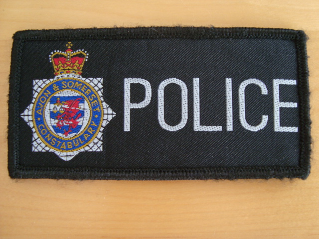 Avon & Somerset Constabulary patch
Velcro type front chest patch. 
Keywords: Avon Somerset patch