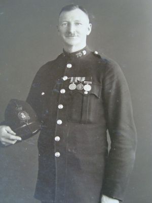 Bristol Constabulary PC 75
PC George Arthur Copp, 75 'D' division, on retirement 1938

Served as a Sapper in the Royal Engineers during WW1.
He was one of the 265 Bristol Police Constables who served in the armed forces during WW1.

Joined Bristol Constabulary in 1912.
He received his Bristol Police Long Service medal 5-6-1929 and bar for 22 years service 30-5-1934 which means if he retired in 1938 that he served 26 years with the force.
The medals that he is wearing in the photo from right to left are the British War medal and Victory medal for his WW1 service and the Bristol Police Long Service medal.

Information from: Simon Grant
Keywords: Bristol