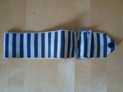 Duty armband
Duty armband with buckle and press studs c1960s
Keywords: armband 